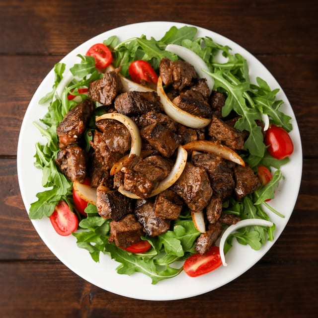 S2. Shaky Beef Over White Rice (Com Bo LLac).
